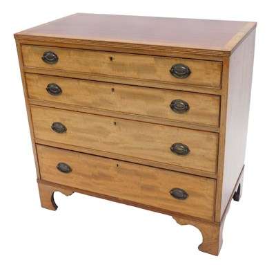 Lot 990 - A mahogany chest of drawers in George III...