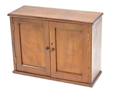 Lot 993 - A mahogany coin collector's cabinet, with two...