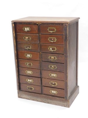 Lot 1068 - An oak and pine office cabinet, inset with...