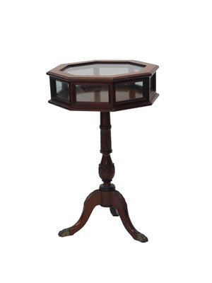 Lot 1070 - A Continental mahogany display table, the...