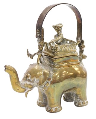 Lot 71 - A 20thC Indian brass teapot, modelled as an...