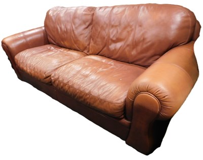 Lot 1047 - A brown leather upholstered sofa, 232cm wide.