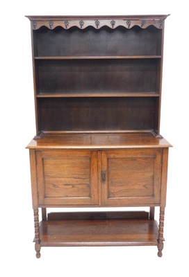 Lot 1054 - An oak dresser, the raised back with...