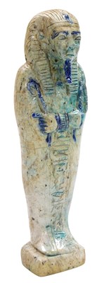 Lot 9 - A blue green faience ushabti figure of a...
