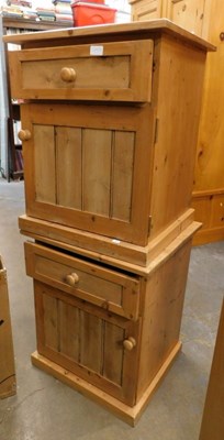Lot 1695a - A pair of pine bedside cabinets, with a single...