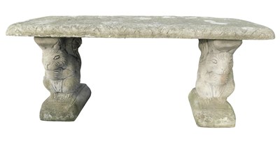 Lot 1083 - A composition garden seat, with squirrel...