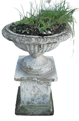 Lot 1089 - A painted composition campana shaped garden...