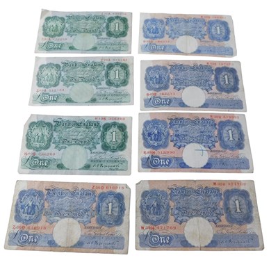 Lot 61 - Eight Bank of England one pound banknotes, K O...