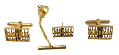 Lot 62 - A pair of silver-gilt cufflinks and a matching...