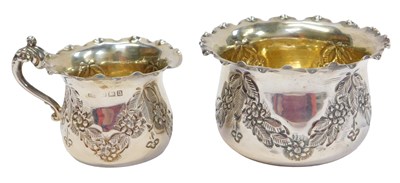 Lot 66 - A George V silver small sugar bowl, embossed...
