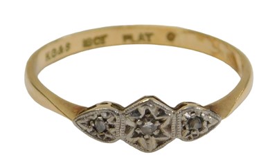 Lot 67 - An 18ct gold and diamond three stone ring,...
