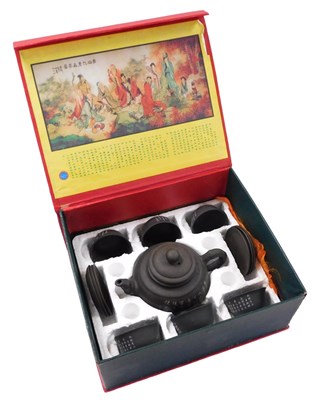 Lot 113 - A 20thC Chinese Yixing pottery tea set,...