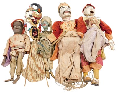 Lot 118 - A group of Javanese and other wooden puppets....