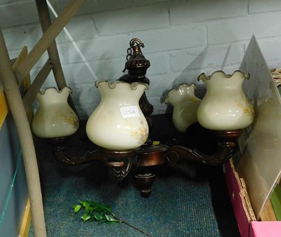 Lot 2256a - A wooden five branch light fitting, with cream...