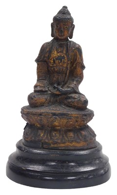 Lot 123 - A 17thC gilt metal Tibetan Shakyamuni Buddha...