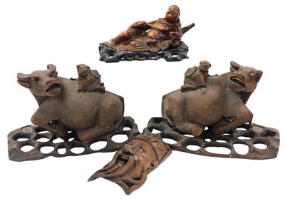 Lot 128 - A late 19thC Chinese carved wood figure of...