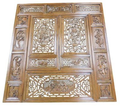 Lot 108 - A 20thC Chinese teak window panel, the central...