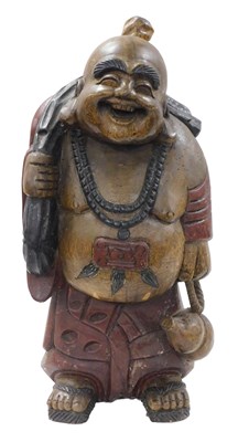 Lot 136 - A Chinese wooden carved figure of a laughing...