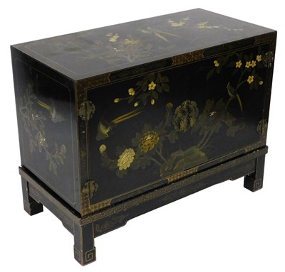 Lot 159 - A Chinese black lacquer cabinet, decorated to...
