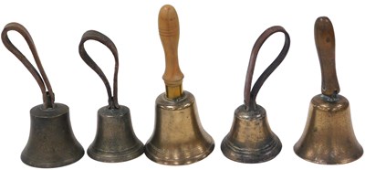 Lot 184 - Five brass hand bells, two with turned wooden...