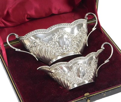 Lot 231 - A Victorian silver cream jug and sugar bowl,...