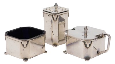 Lot 232 - A George V Art Deco silver three piece cruet...