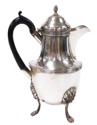 Lot 252 - A Victorian silver coffee pot, raised on leaf...