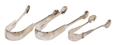 Lot 258 - A pair of George IV silver sugar tongs, London...