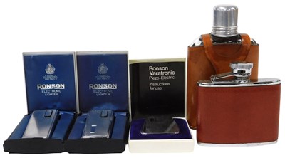 Lot 225 - Two leather bound hip flasks, a champange tap,...