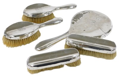 Lot 267 - An Edward VII silver backed five piece...