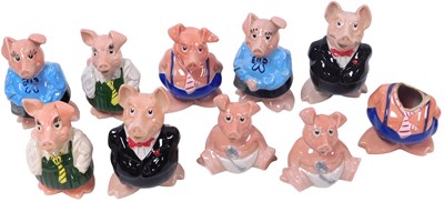 Lot 293 - Two sets of Wade pottery NatWest piggy banks....