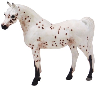 Lot 294 - A Wade pottery figure of an Appaloosa horse,...