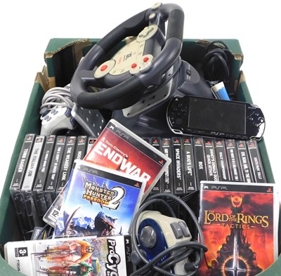 Lot 299 - A Sony PS1, Gamester Dualforce steering wheel...