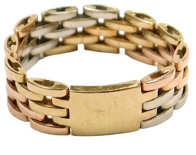 Lot 326 - A three colour four bar gate ring, with a...