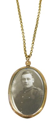 Lot 329 - An Edwardian gold plated double sided photo...