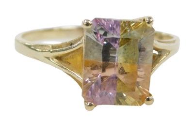 Lot 339 - A multi-colour gemstone set solitaire ring,...