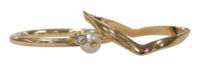 Lot 346 - A seed pearl and CZ dress ring, in yellow...