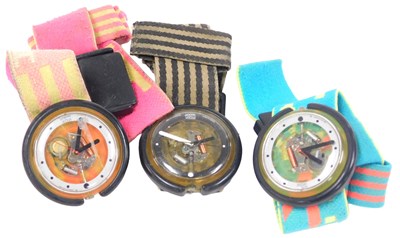 Lot 351 - Three 1980s Swatch Pop watches, with visible...