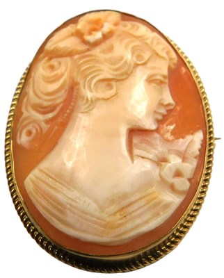 Lot 360 - A 9ct gold and shell cameo brooch, bust...
