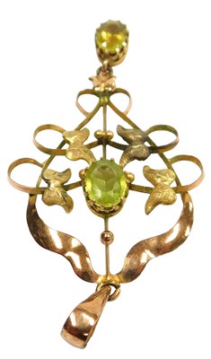 Lot 362 - An Edwardian Art Nouveau peridot set...