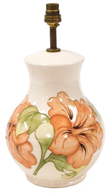 Lot 457 - A Moorcroft pottery Hibiscus pattern table...