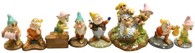 Lot 477 - Seven Royal Doulton pottery Snow White and the...