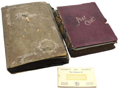 Lot 402 - Postcards. Two albums of Edwardian and later...