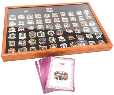 Lot 406 - A Danbury Mint Diamond Jubilee pin collection,...