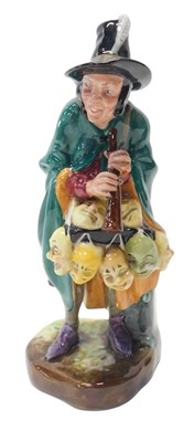 Lot 174 - A Royal Doulton figure modelled as The Mask...