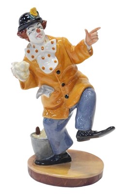 Lot 180 - A Royal Doulton figure modelled as The...