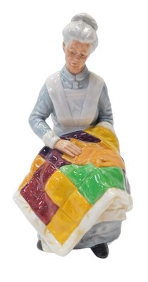 Lot 188 - A Royal Doulton figure modelled as...