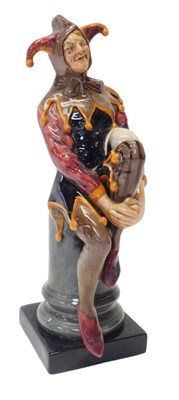 Lot 190 - A Royal Doulton figure modelled as The...