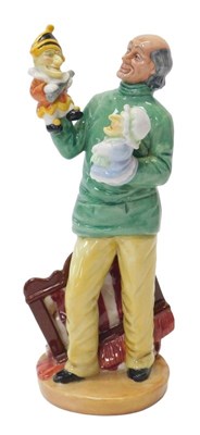 Lot 195 - A Royal Doulton figure modelled as Punch and...