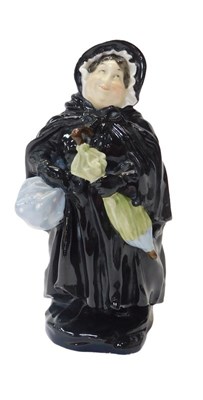 Lot 200 - A Royal Doulton figure modelled as Sairey Gamp,...